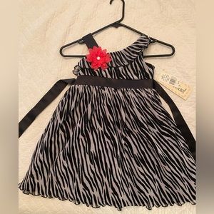 Zebra print dress with pink flower, size 4
